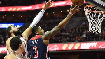 Dec 31, 2017; Washington, DC, USA; Washington Wizards guard Bradley Beal (3) shoots over Chicago Bulls forward Nikola Mirotic (44) during the second half at Capital One Arena. Mandatory Credit: Brad Mills-USA TODAY Sports