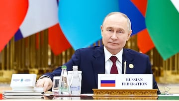 Russian President Vladimir Putin attends a plenary session of the International Forum dedicated to the International Year of Peace and Trust, the International Day of Neutrality, and the 30th anniversary of Turkmenistan's neutrality status, at the Congress Centre in Ashgabat, Turkmenistan December 12, 2025. Sputnik/Alexander Kazakov/Pool via REUTERS ATTENTION EDITORS - THIS IMAGE WAS PROVIDED BY A THIRD PARTY.