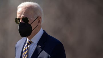 President Joe Biden walks on the South Lawn of the White House to board Marine One, in Washington.