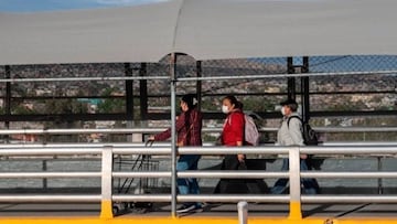 Migrantes con cubrebocas, protegiéndose del coronavirus, 2020.