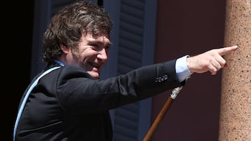 Argentina's President Javier Milei gestures to supporters from the Casa Rosada balcony, after his swearing-in ceremony, in Buenos Aires, Argentina December 10, 2023. REUTERS/Agustin Marcarian