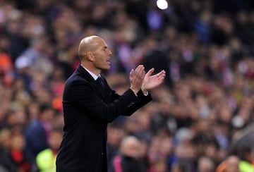 Real Madrid manager Zinedine Zidane applauds his team during the La Liga match between Club Atletico de Madrid and Real Madrid CF at Vicente Calderon Stadium on November 19, 2016 in Madrid, Spain.