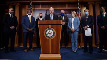 Republican Senate Majority Leader Mitch McConnell flanked by other members of Congress.