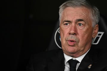 Real Madrid's Italian coach Carlo Ancelotti looks on prior the Spanish league football match between Real Madrid CF and Deportivo Alaves at the Santiago Bernabeu stadium in Madrid on September 24, 2024. (Photo by JAVIER SORIANO / AFP)