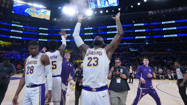 Apr 12, 2026; Los Angeles, California; Los Angeles Lakers forward LeBron James (23) throws powdered chalk into the air during the game against the Utah Jazz at the Crypto.com Arena. Mandatory Credit: Kirby Lee-Imagn Images