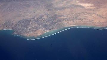 An aerial view shows hotels and resorts on the coast of the Red Sea, through the window of a plane before landing at Marsa Alam International Airport, at Egypt's Red Sea coast in Marsa Alam, Egypt March 23, 2025. REUTERS/Amr Abdallah Dalsh