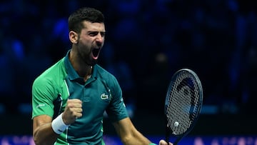 Serbia's Novak Djokovic celebrates after winning the final match against Italy's Jannik Sinner at the ATP Finals tennis tournament in Turin on November 19, 2023. (Photo by Tiziana FABI / AFP)