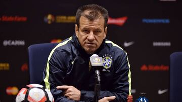 Brazil coach Carlos Caetano Bledorn Verri, commonly known as Dunga, speaks during a press conference at Gillette Stadium in Foxborough, Massachusetts on June 11, 2016. / AFP PHOTO / HECTOR RETAMAL