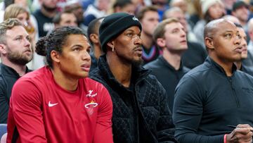 Oct 28, 2023; Minneapolis, Minnesota, USA; Miami Heat forward Jimmy Butler (22) watches play against the Minnesota Timberwolves in the first quarter at Target Center. Mandatory Credit: Matt Blewett-USA TODAY Sports