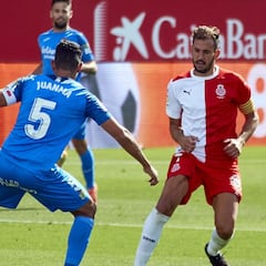 El Girona acecha el playoff ante un Málaga agotado y en transición