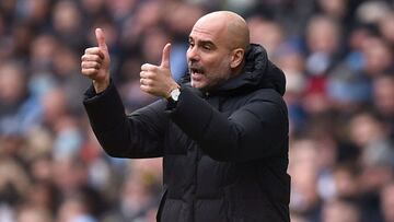 Manchester City&#039;s Spanish manager Pep Guardiola gestures during the English Premier League football match between Manchester City and Chelsea at the Etihad Stadium in Manchester, north west England, on January 15, 2022. (Photo by Oli SCARFF / AFP) / 