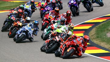 MotoGP - German Grand Prix - Sachsenring, Hohenstein-Ernstthal, Germany - July 13, 2025 Ducati Lenovo Team's Marc Marquez, BK8 Gresini Racing MotoGP's Alex Marquez and Aprilia Racing's Marco Bezzecchi in action with riders during the race REUTERS/Lisi Niesner TPX IMAGES OF THE DAY