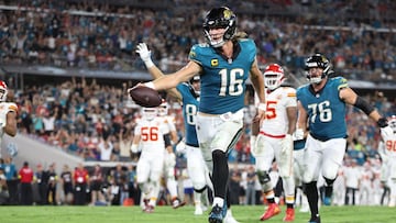 Oct 6, 2025; Jacksonville, Florida, USA; Jacksonville Jaguars quarterback Trevor Lawrence (16) scores a touchdown during the second half against the Kansas City Chiefs at EverBank Stadium. Mandatory Credit: Nathan Ray Seebeck-Imagn Images