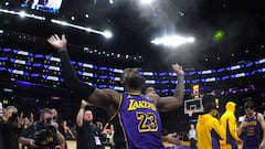 Los Angeles Lakers forward LeBron James (23) throws powdered chalk before the game against the Brooklyn Nets at Crypto.com Arena.