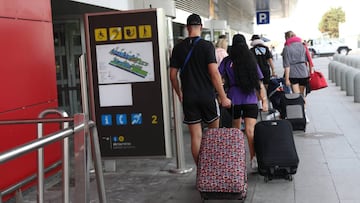 A group of Jet2 holidaymakers returning to the UK arrive at Ibiza international airport, as the travel firm has announced it will refund customers on holiday in Spain who have been asked to fly back to the UK early. Picture date: Sunday August 2, 2020. **