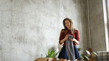 Young woman moving to new home