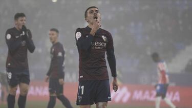 La calima del M¨¢laga contra las dudas del Huesca de Xisco