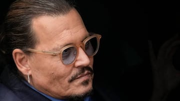 FAIRFAX, VA - MAY 27: Actor Johnny Depp sits in his vehicle as he departs the Fairfax County Courthouse on May 27, 2022 in Fairfax, Virginia. Closing arguments in the Depp v. Heard defamation trial, brought by Johnny Depp against his ex-wife Amber Heard, concluded today and jury deliberations begin. (Photo by Drew Angerer/Getty Images)