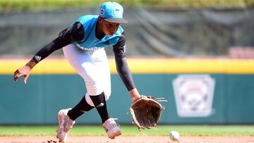 Aug 25, 2022; Williamsport, PA, USA; Caribbean Region third baseman Shemar Jacobus (9) fields a ground ball in the third inning against the Mexico Region. Mandatory Credit: Evan Habeeb-USA TODAY Sports