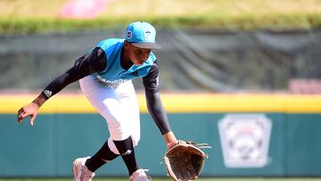 Aug 25, 2022; Williamsport, PA, USA; Caribbean Region third baseman Shemar Jacobus (9) fields a ground ball in the third inning against the Mexico Region. Mandatory Credit: Evan Habeeb-USA TODAY Sports