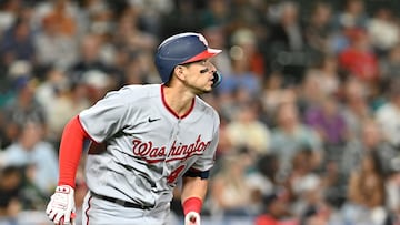 Aug 23, 2022; Seattle, Washington, USA; Washington Nationals right fielder Joey Meneses (45) runs towards first base after hitting a double against the Seattle Mariners during the ninth inning at T-Mobile Park. Seattle defeated Washington 4-2. Mandatory Credit: Steven Bisig-USA TODAY Sports