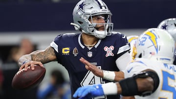 ARLINGTON, TEXAS - DECEMBER 21: Dak Prescott #4 of the Dallas Cowboys drops back to pass against the defense of Los Angeles Chargers in the first quarter of the game at AT&T Stadium on December 21, 2025 in Arlington, Texas. Stacy Revere/Getty Images/AFP (Photo by Stacy Revere / GETTY IMAGES NORTH AMERICA / Getty Images via AFP)