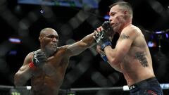 Kamaru Usman golpea a Colby Covington.