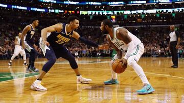 BOSTON, MA - DECEMBER 13: Kyrie Irving #11 of the Boston Celtics handles the ball against Jamal Murray #27 of the Denver Nuggets during the second half at TD Garden on December 13, 2017 in Boston, Massachusetts.   Tim Bradbury/Getty Images/AFP
 == FOR NEWSPAPERS, INTERNET, TELCOS &amp; TELEVISION USE ONLY ==