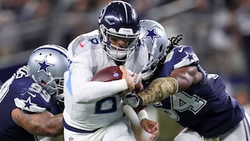 ARLINGTON, TX - NOVEMBER 05: Antwaun Woods #99 of the Dallas Cowboys and Jaylon Smith #54 of the Dallas Cowboys are unable to stop the touchdown run in the fourth quarter of a football game at AT&amp;T Stadium on November 5, 2018 in Arlington, Texas.   To