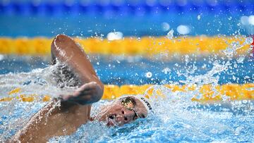 Tunisia's Ahmed Hafnaoui competes in a heat of the men's 800m freestyle swimming event during the 2024 World Aquatics Championships at Aspire Dome in Doha on February 13, 2024. (Photo by Oli SCARFF / AFP)