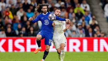 MADRID, SPAIN - APRIL 12: Marc Cucurella of Chelsea FC and Dani Carvajal of Real Madrid battle for the ball during the UEFA Champions League quarterfinal first leg match between Real Madrid and Chelsea FC at Estadio Santiago Bernabeu on April 12, 2023 in Madrid, Spain. (Photo by Manuel Reino Berengui/DeFodi Images via Getty Images)