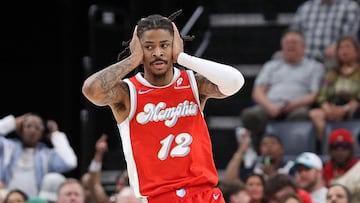 MEMPHIS, TENNESSEE - APRIL 10: Ja Morant #12 of the Memphis Grizzlies reacts during the first half against the Minnesota Timberwolves at FedExForum on April 10, 2025 in Memphis, Tennessee. NOTE TO USER: User expressly acknowledges and agrees that, by downloading and or using this photograph, User is consenting to the terms and conditions of the Getty Images License Agreement. Justin Ford/Getty Images/AFP (Photo by Justin Ford / GETTY IMAGES NORTH AMERICA / Getty Images via AFP)