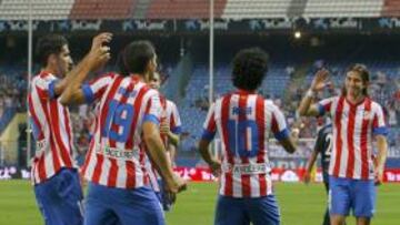 <b>CELEBRACIÓN. </b>Raúl García, Borja, Arda y Filipe Luis se felicitan por el segundo gol del Atlético, obra del canterano rojiblanco.