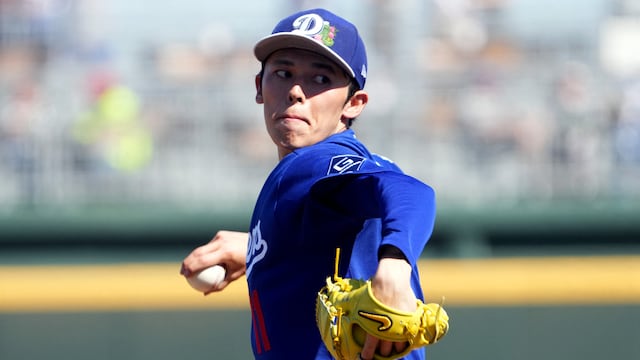 Mar 3, 2026; Goodyear, Arizona, USA; Los Angeles Dodgers starting pitcher Roki Sasaki (11) pitches against the Cleveland Guardians during the third inning at Goodyear Ballpark. Mandatory Credit: Joe Camporeale-Imagn Images