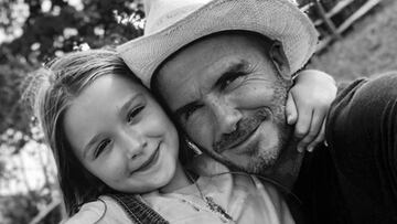 David Beckham y su hija Harper posando agarrados y sonrientes