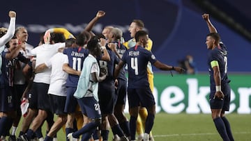 PSG players celebrate at the end of the Champions League semifinal soccer match between RB Leipzig and Paris Saint-Germain at the Luz stadium in Lisbon, Portugal, Tuesday, Aug. 18, 2020. PSG won the match 3-0. (AP Photo/Manu Fernandez)