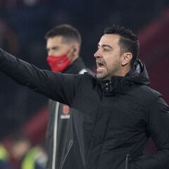 How many Spanish Super Cups did Xavi win as a Barcelona player?