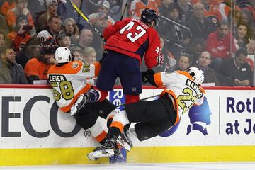 Tom Wilson, Taylor Leier y Brandon Manning