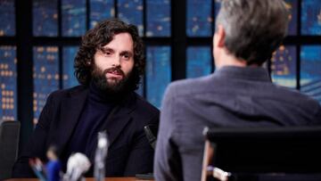 LATE NIGHT WITH SETH MEYERS -- Episode 1392 -- Pictured: (l-r) Actor Penn Badgley during an interview with host Seth Meyers on February 9, 2023 -- (Photo by: Lloyd Bishop/NBC via Getty Images)