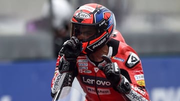 Ducati's Italian rider Danilo Petrucci celebrates as he crosses the finish line to wins in the French MotoGP race in Le Mans, northwestern France, on October 11, 2020. (Photo by JEAN-FRANCOIS MONIER / AFP)
