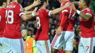 Los jugadores del Manchester United celebran uno de sus goles ante el Wolfsburgo en la Champions.