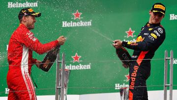 MONTREAL, QC - JUNE 10: Race winner Sebastian Vettel of Germany and Ferrari and third place finisher Max Verstappen of Netherlands and Red Bull Racing celebrate on the podium during the Canadian Formula One Grand Prix at Circuit Gilles Villeneuve on June 10, 2018 in Montreal, Canada. Will Taylor-Medhurst/Getty Images/AFP
== FOR NEWSPAPERS, INTERNET, TELCOS & TELEVISION USE ONLY ==