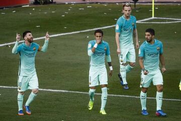 Lionel Messi celebrates scorer another winner for Barcelona.