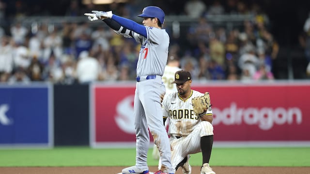 SAN DIEGO, CALIFORNIA - JUNE 09: Shohei Ohtani #17 of the Los Angeles Dodgers reacts after being safe at second base on a throwing error as Xander Bogaerts #2 of the San Diego Padreslooks on 2during the eighth inning of a game at Petco Park on June 09, 2025 in San Diego, California. Sean M. Haffey/Getty Images/AFP (Photo by Sean M. Haffey / GETTY IMAGES NORTH AMERICA / Getty Images via AFP)