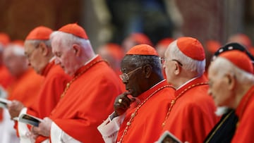 Cardinals stand, on the day of the translation of Pope Francis' body, in St. Peter's Basilica at the Vatican, April 23, 2025. REUTERS/Yara Nardi