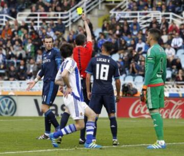 Bale goes into Undiano Mallenco's notebook.