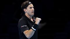 LONDON, ENGLAND - NOVEMBER 15: Dominic Thiem of Austria celebrates match point during his round robin match against Stefanos Tsitsipas of Greece during their first round robin match on Day one of the Nitto ATP World Tour Finals at The O2 Arena on November 15, 2020 in London, England. (Photo by Clive Brunskill/Getty Images)