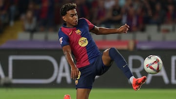 Barcelona's Spanish forward #19 Lamine Yamal controls the ball during the Spanish league football match between FC Barcelona and Getafe CF at the Estadi Olimpic Lluis Companys in Barcelona on September 25, 2024. (Photo by LLUIS GENE / AFP)