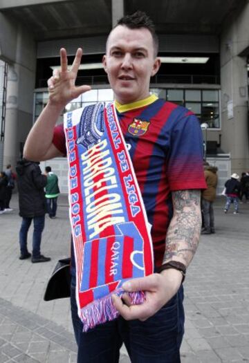 Seguidores del Real Madrid y Barcelona.