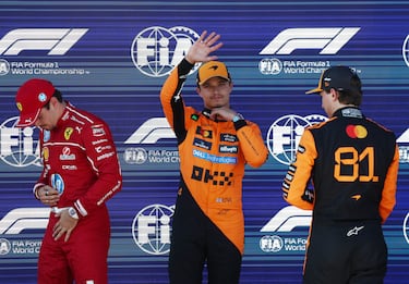 Formula One F1 - Austrian Grand Prix - Red Bull Ring, Spielberg, Austria - June 28, 2025 McLaren's Lando Norris celebrates after qualifying in pole position alongside Ferrari's Charles Leclerc who qualifies in second place and McLaren's Oscar Piastri who qualifies in third place REUTERS/Jakub Porzycki